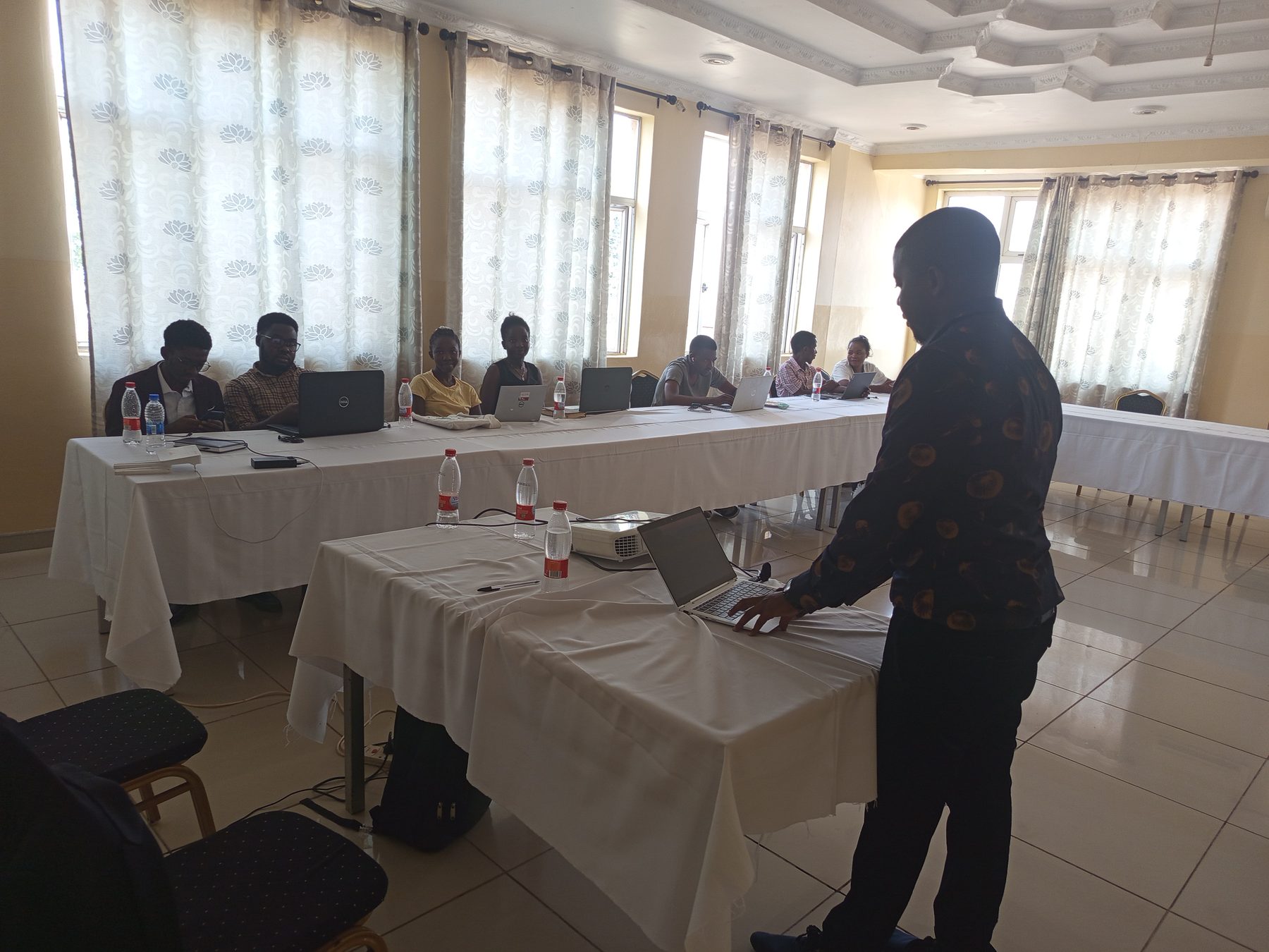 Keki Mawe team leading a digital health and AI training session in Malawi